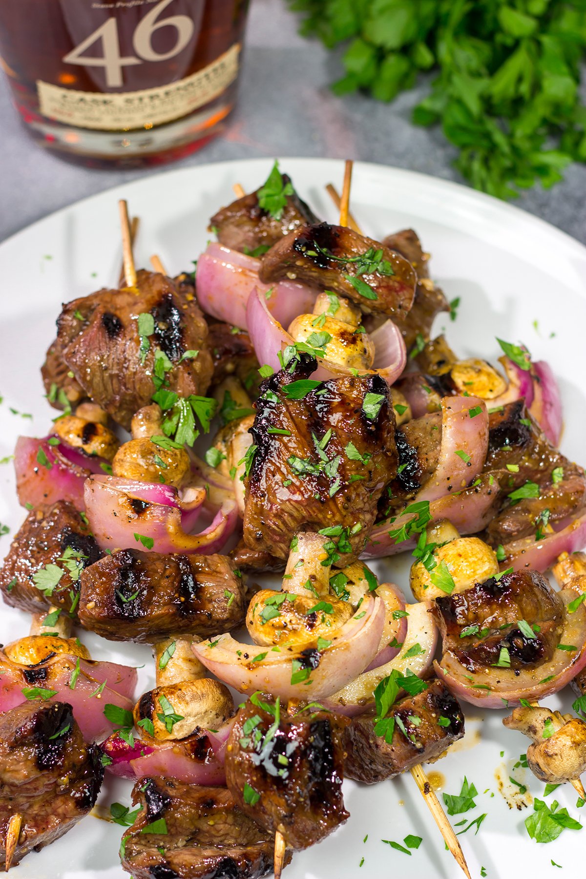These Bourbon Steak Kabobs feature marinated sirloin steak, mushrooms and red onions on skewers. The grilled flavor of these kabobs is fantastic!
