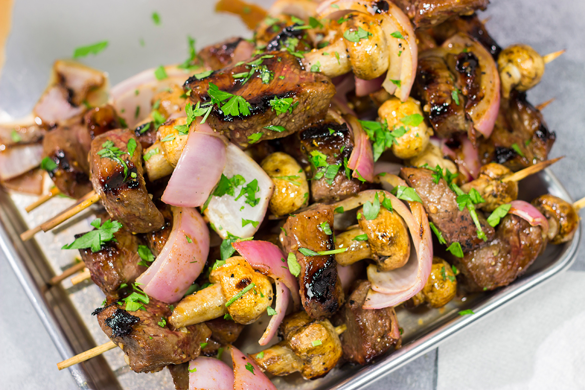 These Bourbon Steak Kabobs feature marinated sirloin steak, mushrooms and red onions on skewers. The grilled flavor of these kabobs is fantastic!