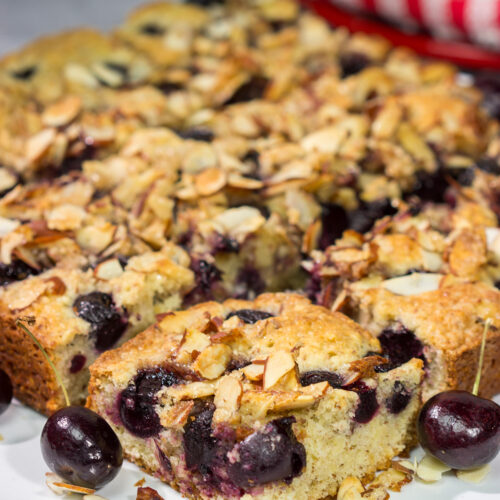 Packed with cherries and topped with a layer of crunchy almonds, this Cherry Almond Cake makes for one heck of a dessert...or breakfast!