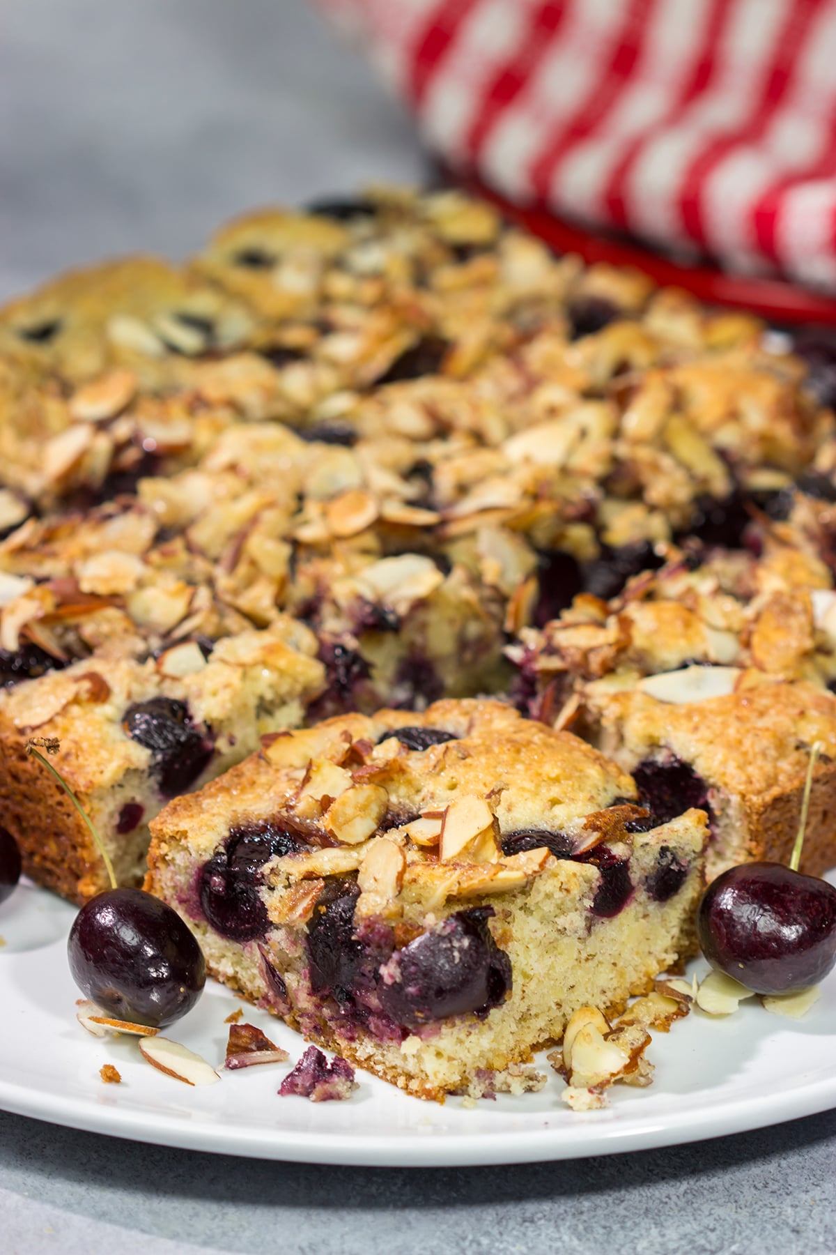 Packed with cherries and topped with a layer of crunchy almonds, this Cherry Almond Cake makes for one heck of a dessert...or breakfast!