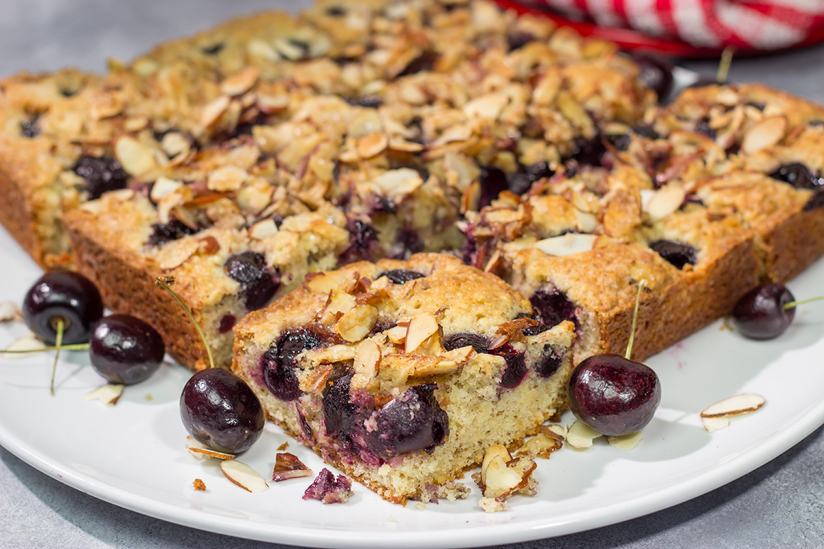 Packed with cherries and topped with a layer of crunchy almonds, this Cherry Almond Cake makes for one heck of a dessert...or breakfast!