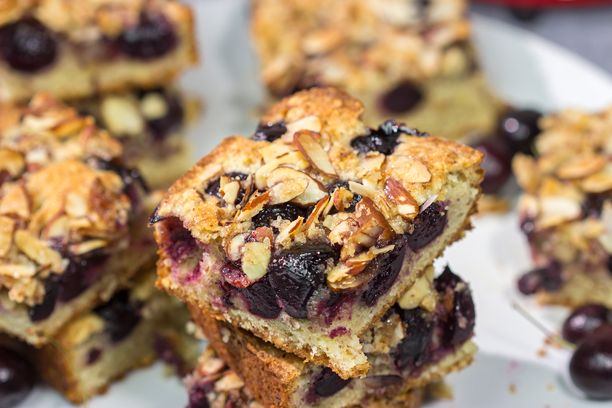 Packed with cherries and topped with a layer of crunchy almonds, this Cherry Almond Cake makes for one heck of a dessert...or breakfast!