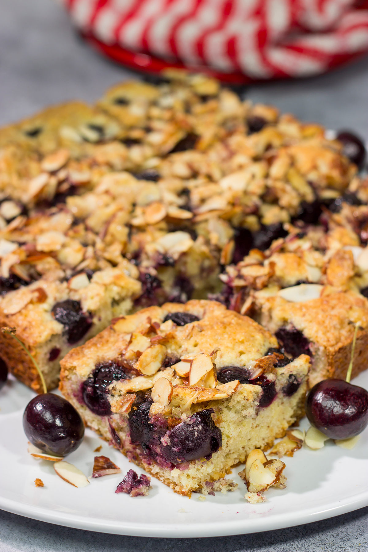 Packed with cherries and topped with a layer of crunchy almonds, this Cherry Almond Cake makes for one heck of a dessert...or breakfast!