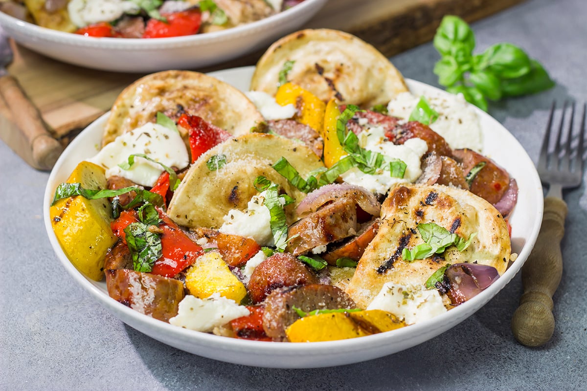 Have you ever grilled pierogies? Give it a shot! This Grilled Pierogies with Sausage and Peppers recipe is a new favorite on our summer grilling menu!