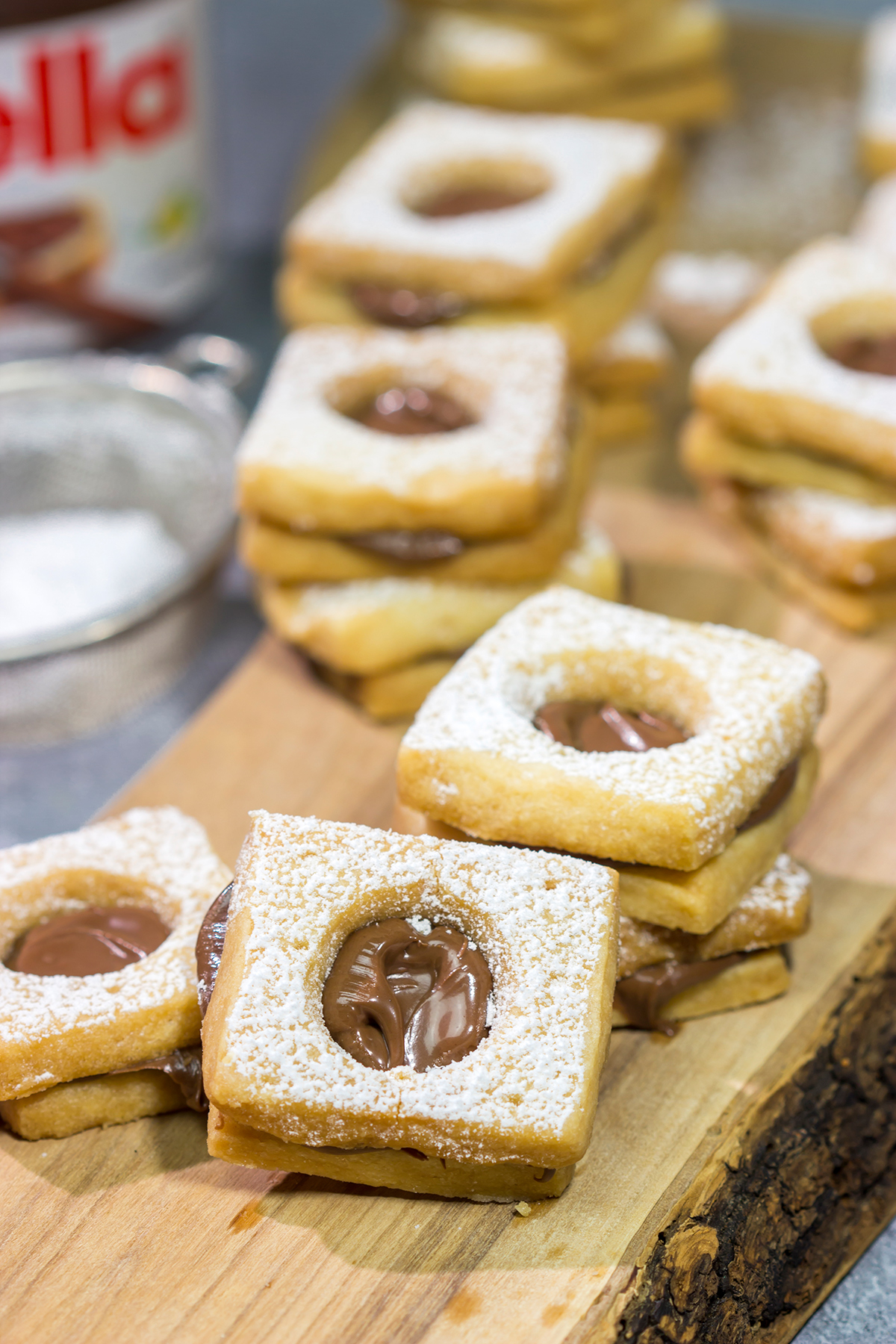 These Nutella Cookies feature buttery shortbread cookies with a schmear of Nutella in between. Good luck eating just one!