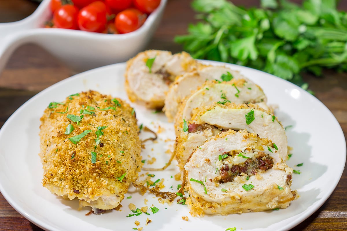 These Pancetta Stuffed Chicken Breasts feature flavorful boneless, skinless chicken breasts stuffed with pancetta, cheese and herbs. They're delicious!