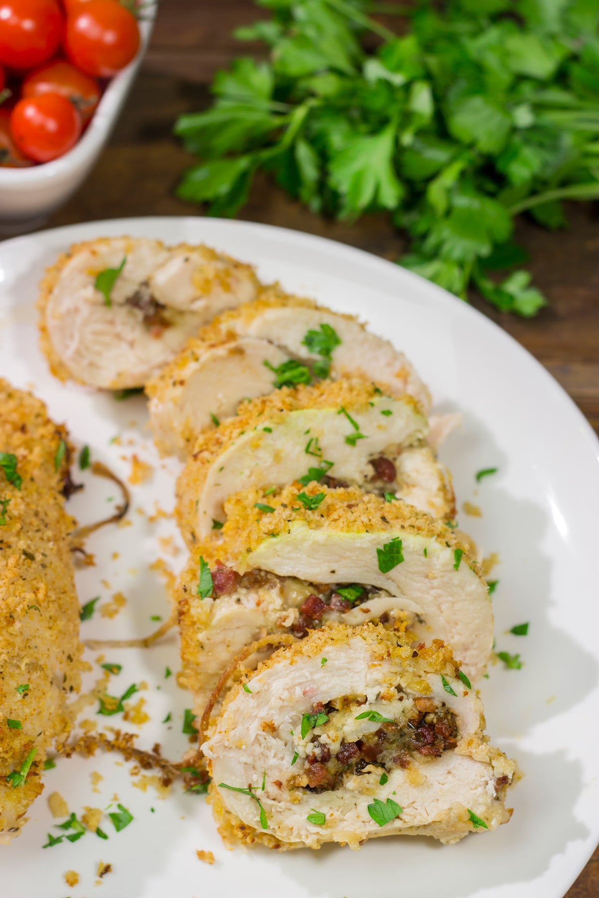 These Pancetta Stuffed Chicken Breasts feature flavorful boneless, skinless chicken breasts stuffed with pancetta, cheese and herbs. They're delicious!
