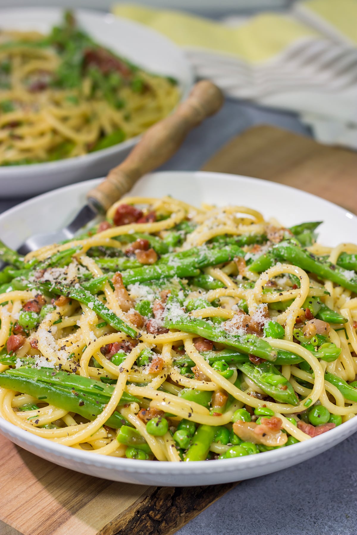Loaded with spring vegetables tossed in a creamy, cheesy sauce, this Spaghetti Carbonara with Spring Vegetables makes for a delicious comfort food meal!