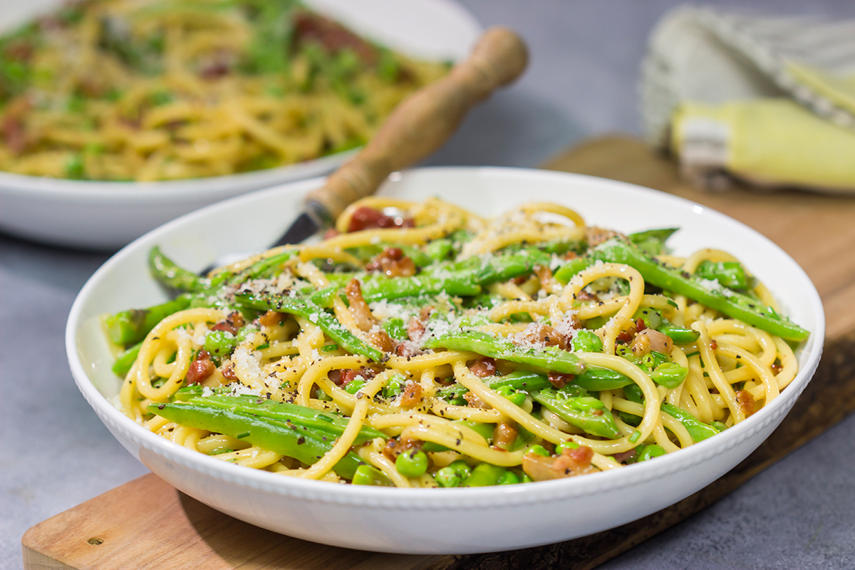 Loaded with spring vegetables tossed in a creamy, cheesy sauce, this Spaghetti Carbonara with Spring Vegetables makes for a delicious comfort food meal!