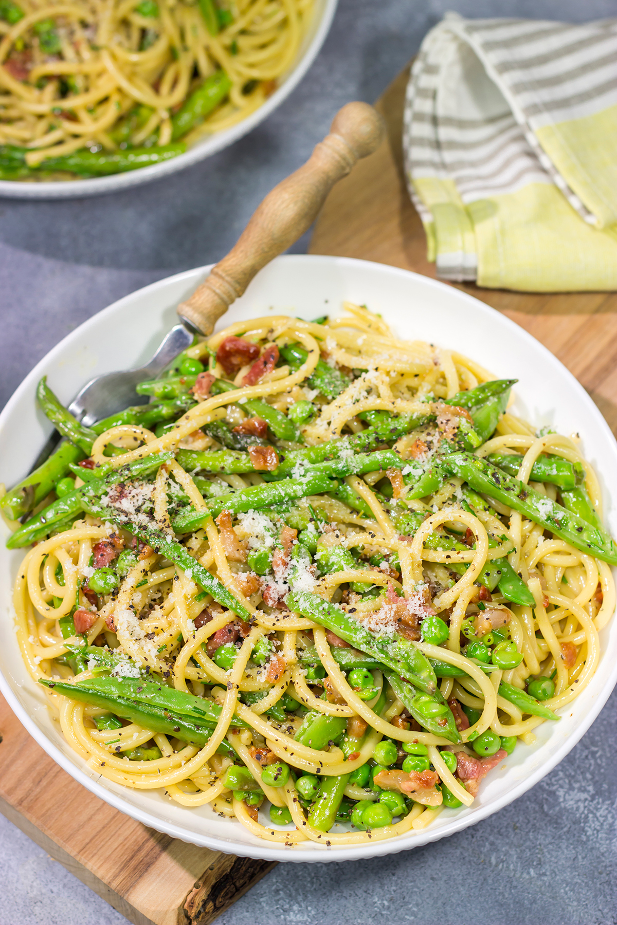 Loaded with spring vegetables tossed in a creamy, cheesy sauce, this Spaghetti Carbonara with Spring Vegetables makes for a delicious comfort food meal!