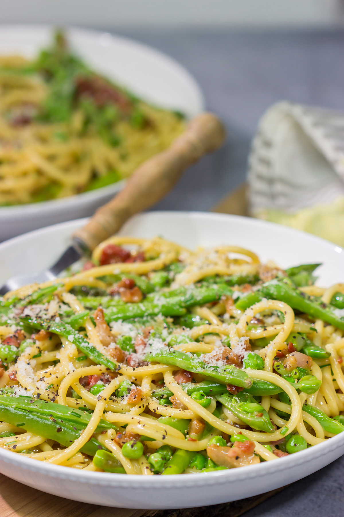 Loaded with spring vegetables tossed in a creamy, cheesy sauce, this Spaghetti Carbonara with Spring Vegetables makes for a delicious comfort food meal!