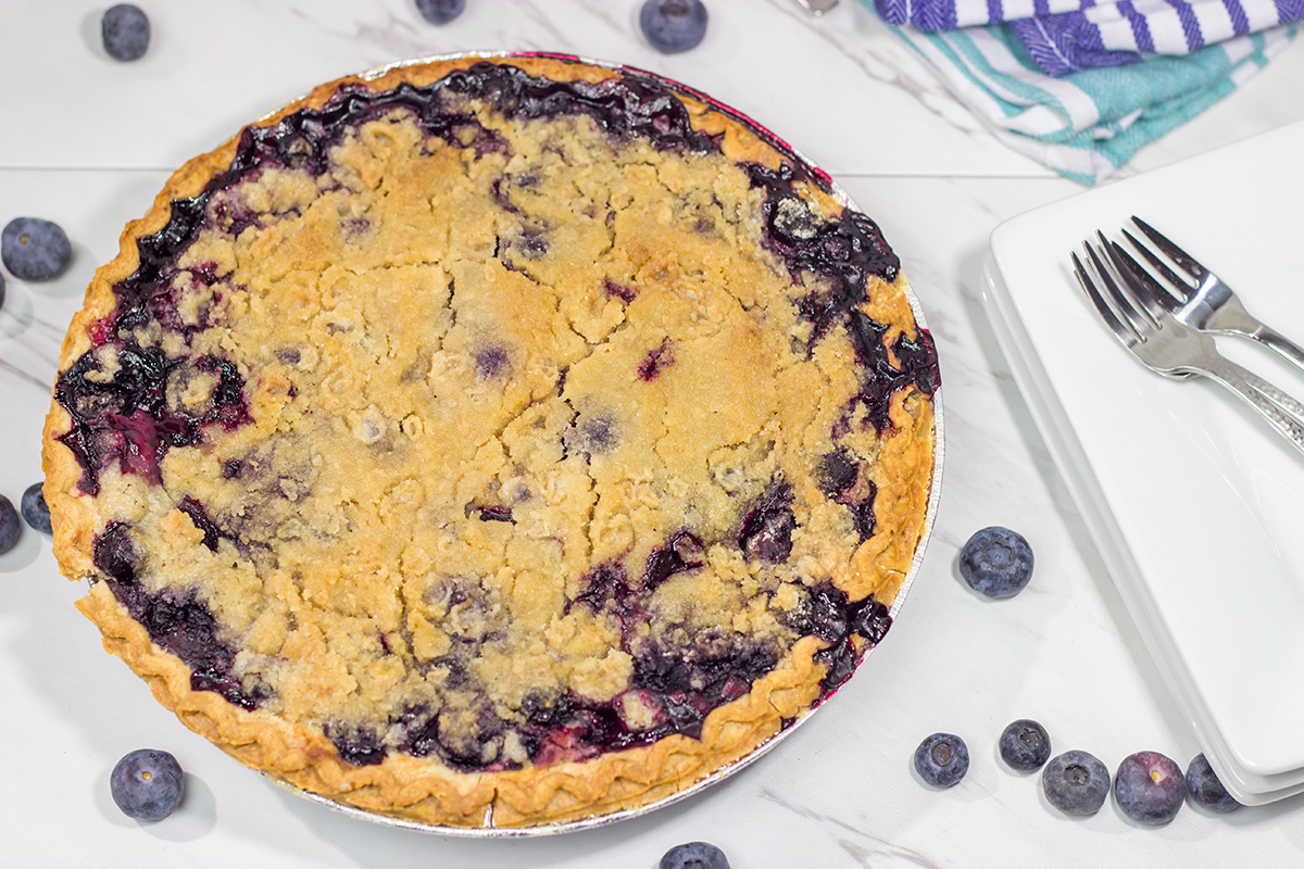 Packed with blueberries, this Blueberry Crumble Pie is a great dessert for a warm summer evening. Don't forget the scoop of ice cream on top!