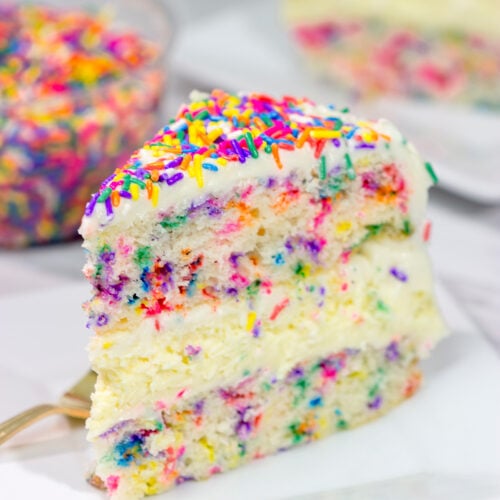Everything's better with sprinkles! This Funfetti Cheesecake Cake features a layer of cheesecake in between two layers of white cake...and lots of sprinkles! It's a fun cake for any sort of celebration.