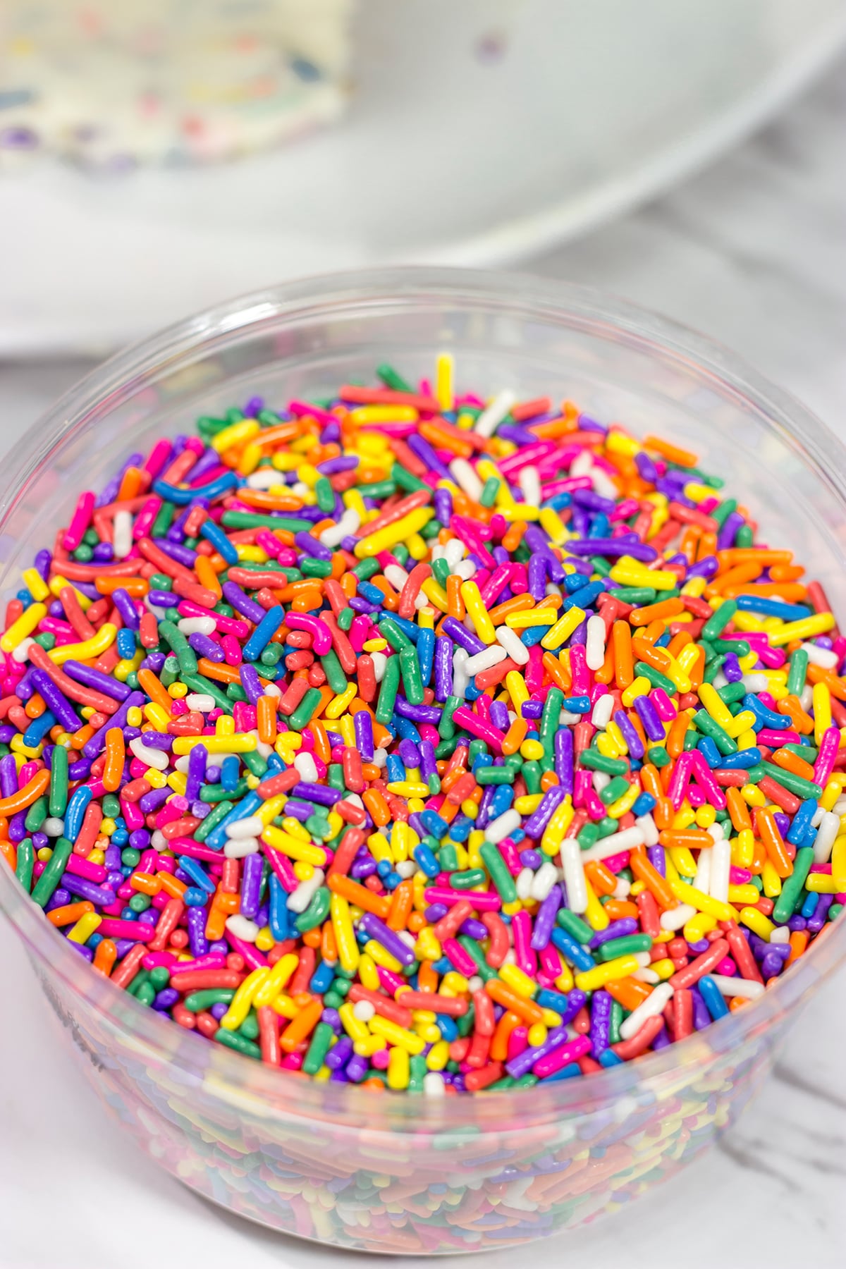 Everything's better with sprinkles! This Funfetti Cheesecake Cake features a layer of cheesecake in between two layers of white cake...and lots of sprinkles! It's a fun cake for any sort of celebration.