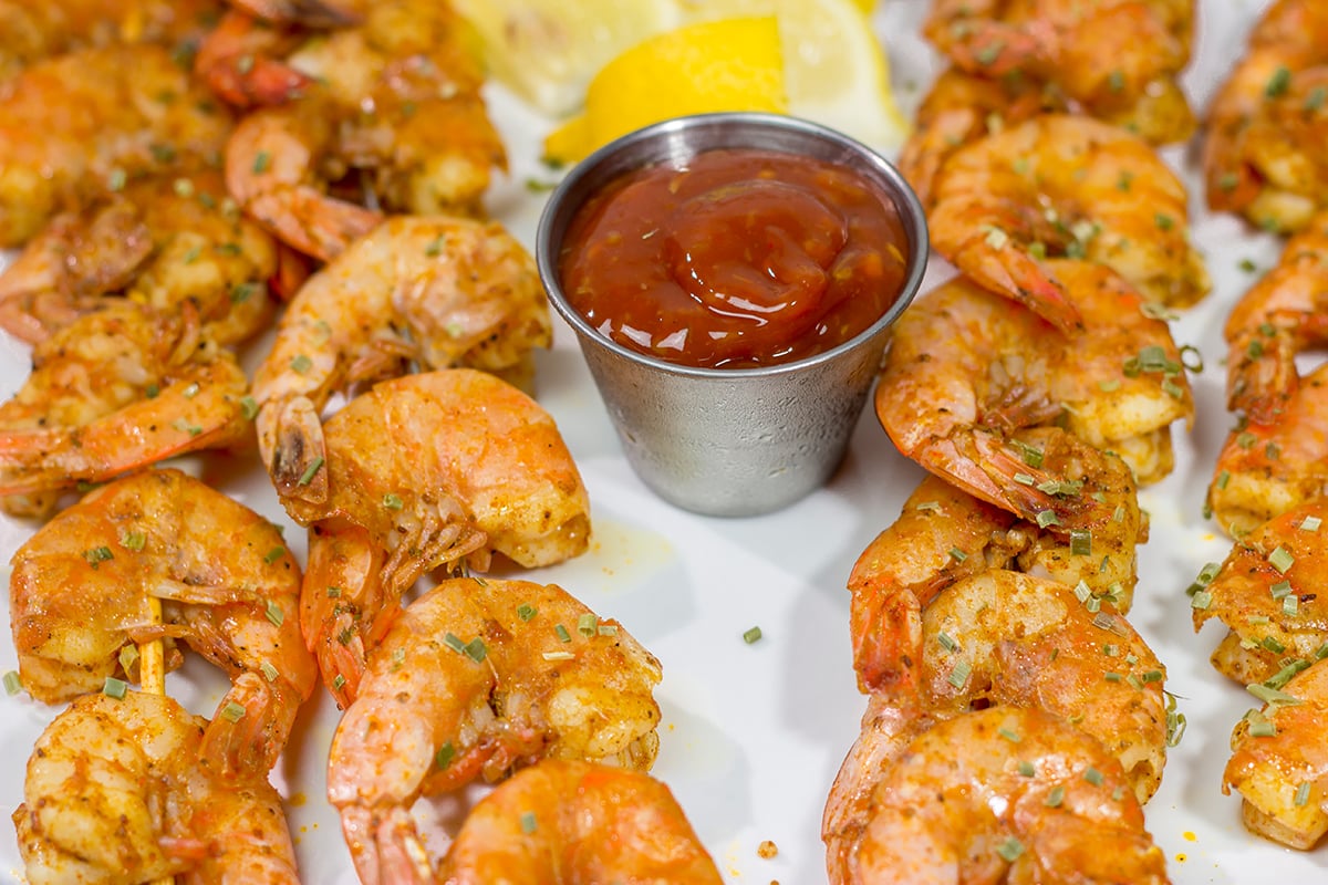 Grilled Peel and Eat Shrimp are easy to make and fun to eat! This tasty shrimp appetizer is an excellent option for summer grilling!