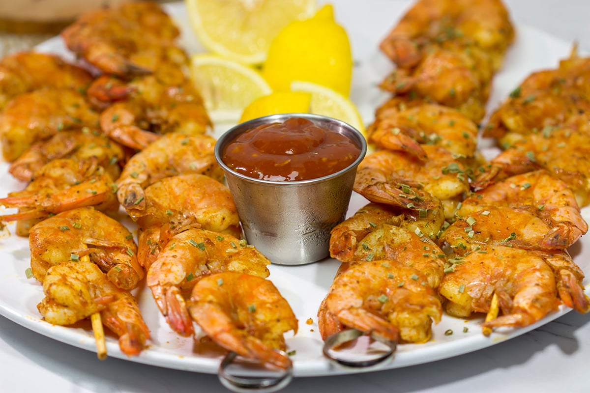 Grilled Peel and Eat Shrimp are easy to make and fun to eat! This tasty shrimp appetizer is an excellent option for summer grilling!
