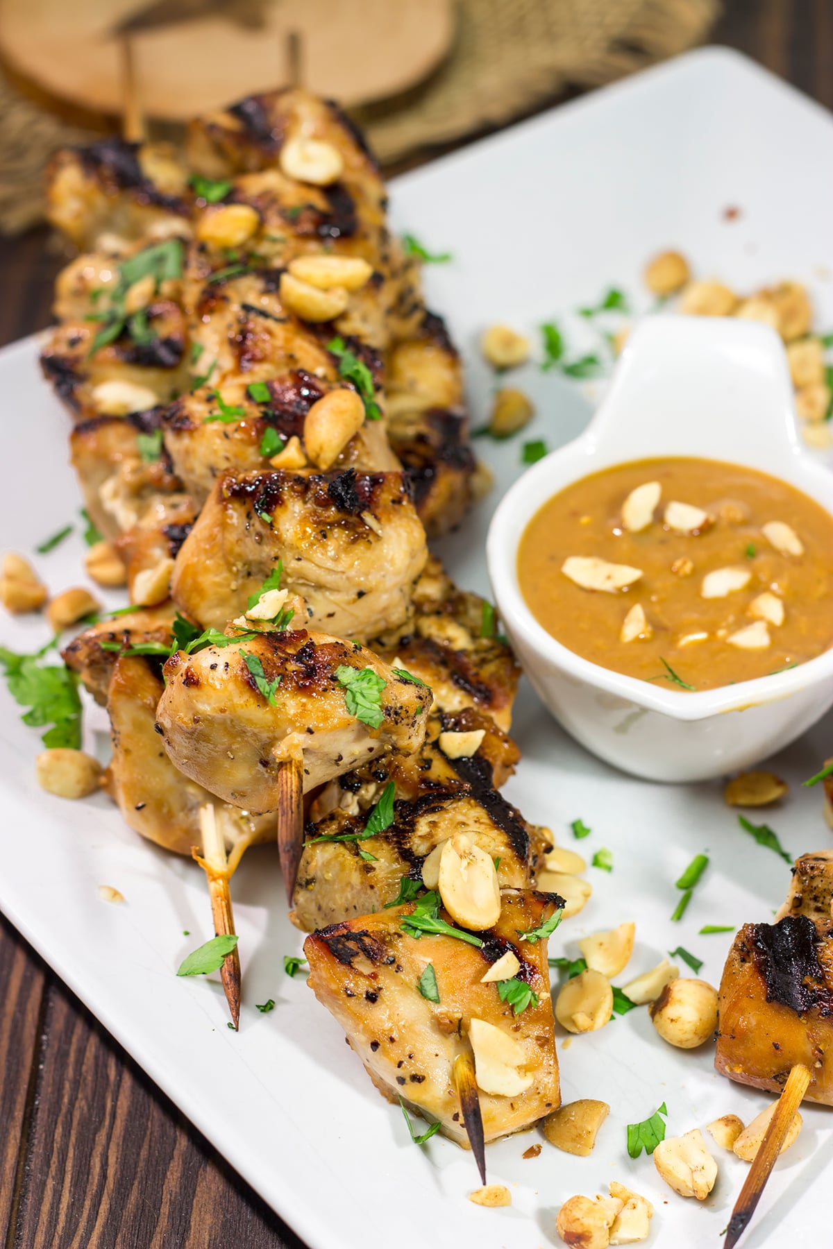 These Thai Chicken Skewers are flavor-packed and easy...perfect for summer grilling in the backyard! Serve 'em up with an Easy Peanut Sauce for maximum taste!