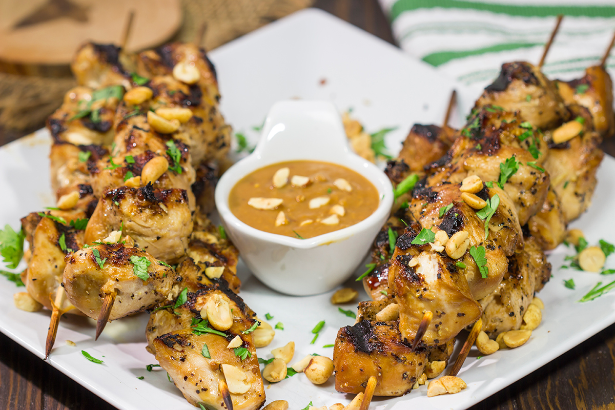 These Thai Chicken Skewers are flavor-packed and easy...perfect for summer grilling in the backyard! Serve 'em up with an Easy Peanut Sauce for maximum taste!