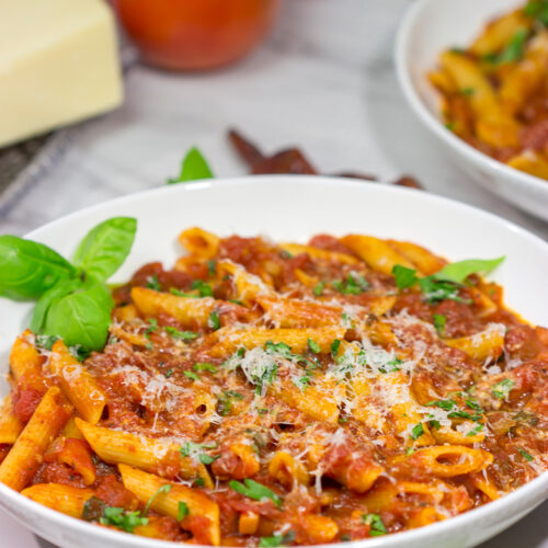 Featuring a generous amount of red pepper flakes and garlic, Arrabbiata Sauce is a delicious (and classic) Italian tomato sauce. Make a batch for dinner tonight!