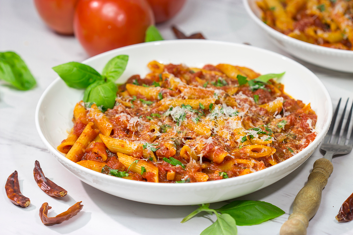 Featuring a generous amount of red pepper flakes and garlic, Arrabbiata Sauce is a delicious (and classic) Italian tomato sauce. Make a batch for dinner tonight!