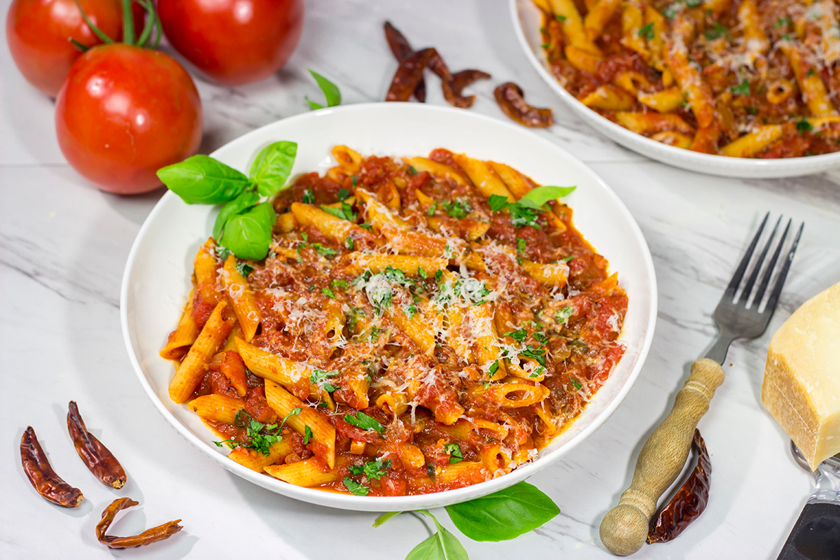 Featuring a generous amount of red pepper flakes and garlic, Arrabbiata Sauce is a delicious (and classic) Italian tomato sauce. Make a batch for dinner tonight!