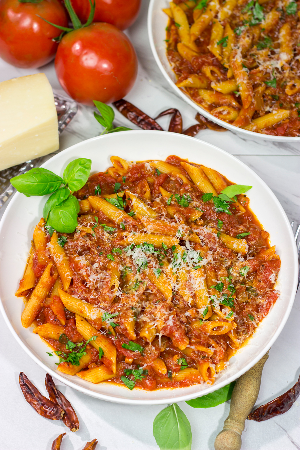 Featuring a generous amount of red pepper flakes and garlic, Arrabbiata Sauce is a delicious (and classic) Italian tomato sauce. Make a batch for dinner tonight!