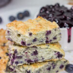 These Blueberry Cream Biscuits are served with blueberry sauce for maximum berry flavor. This easy recipe is great for summer weekend breakfasts!