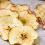 Lightly dusted with cinnamon and sugar, these Oven Baked Cinnamon Apple Chips are an easy (and healthy!) snack. Bake up a batch today!