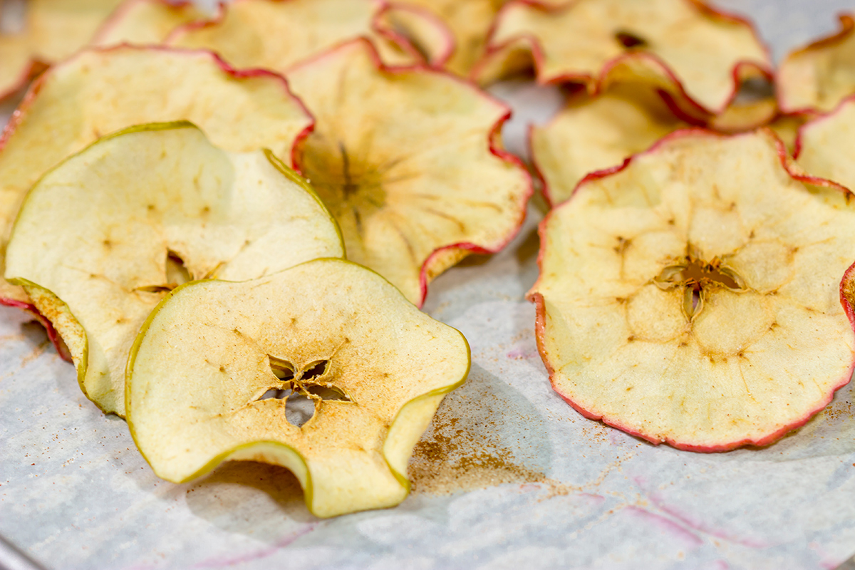 Lightly dusted with cinnamon and sugar, these Oven Baked Cinnamon Apple Chips are an easy (and healthy!) snack. Bake up a batch today!