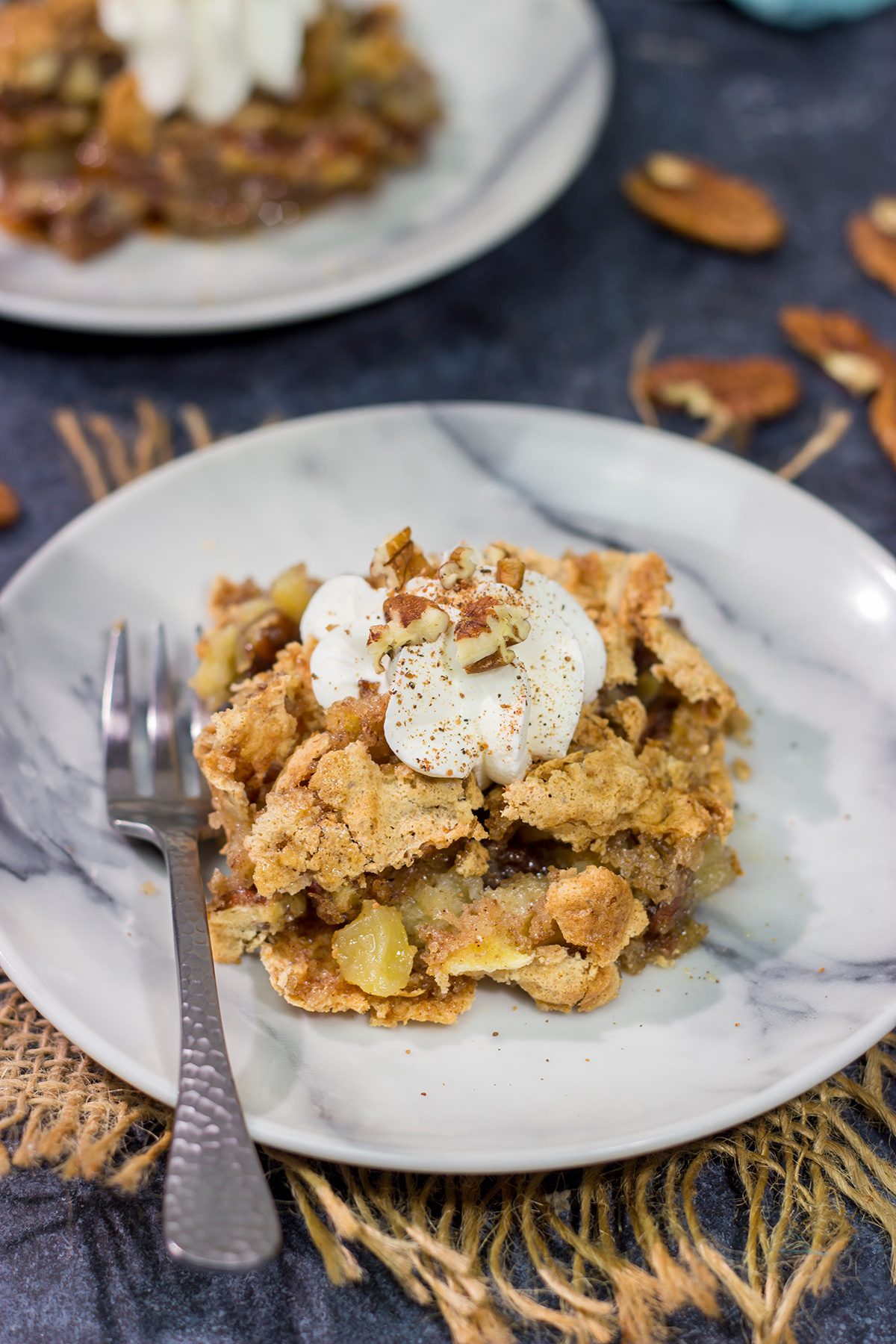 A Huguenot Torte is an iconic Charleston, SC dessert that's packed with apples and pecans. It's a delicious way to celebrate fall baking season!