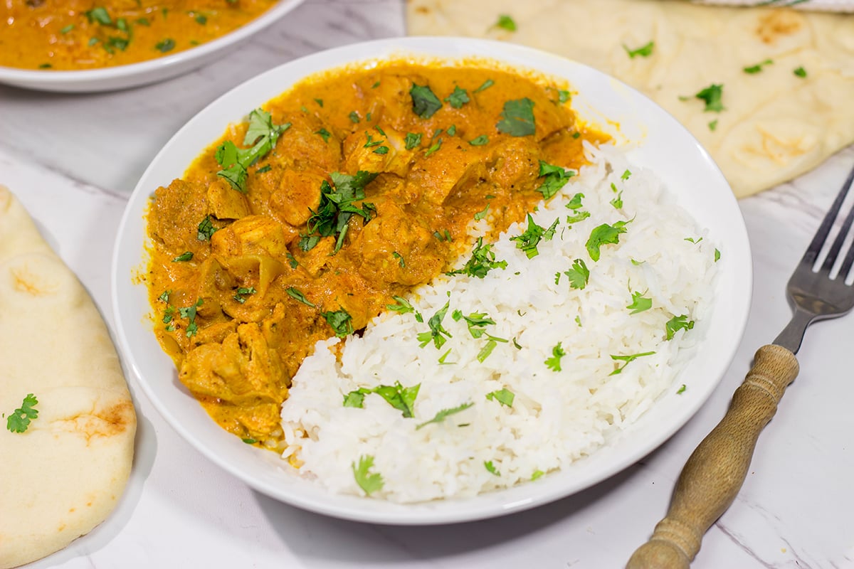 Looking for some tasty comfort food? Pull out the slow cooker and make a batch of this Slow Cooker Chicken Tikka Masala! It's delicious!