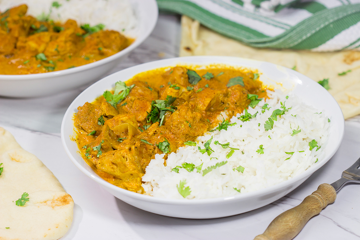 Looking for some tasty comfort food? Pull out the slow cooker and make a batch of this Slow Cooker Chicken Tikka Masala! It's delicious!