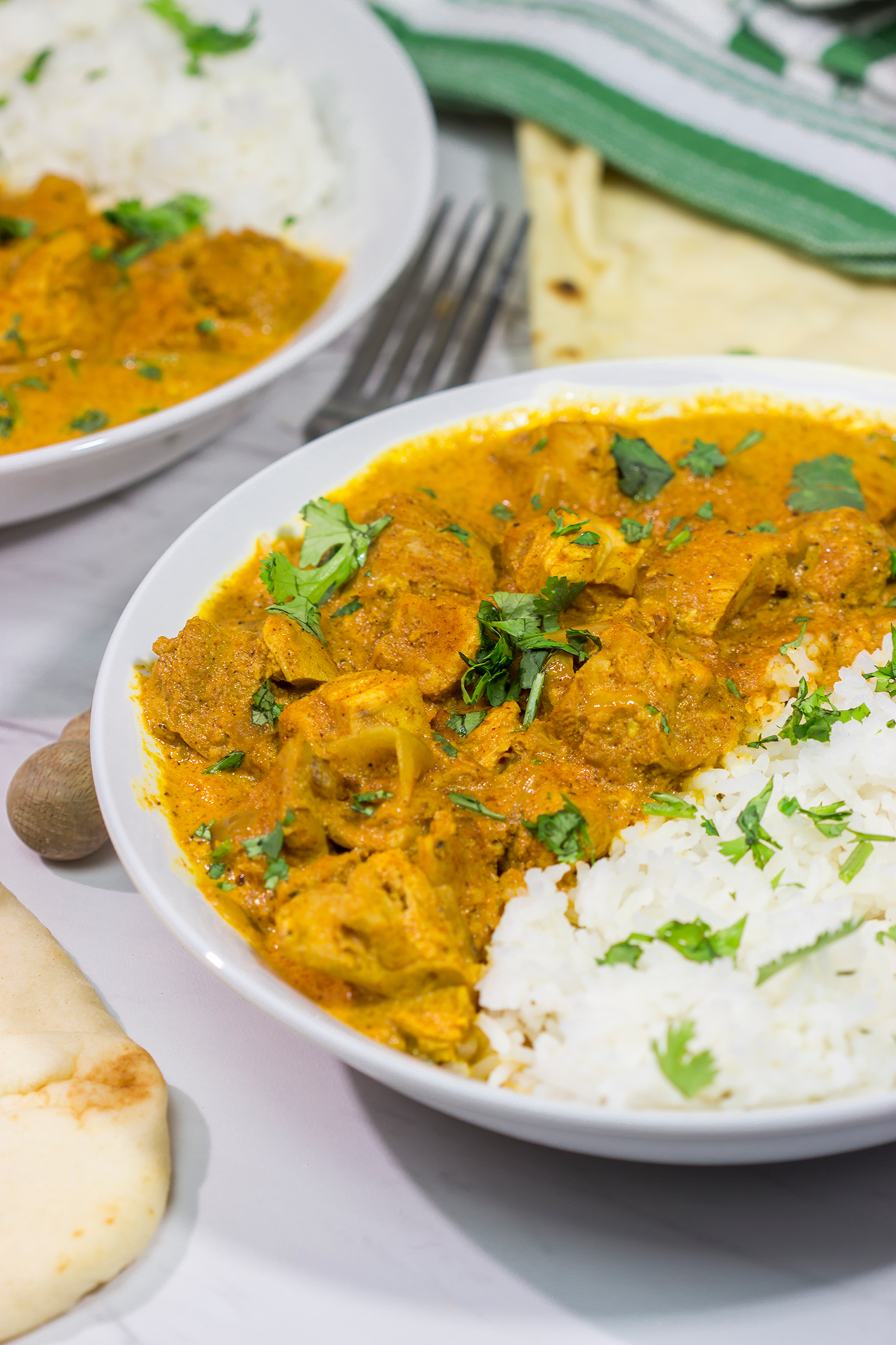 Looking for some tasty comfort food? Pull out the slow cooker and make a batch of this Slow Cooker Chicken Tikka Masala! It's delicious!