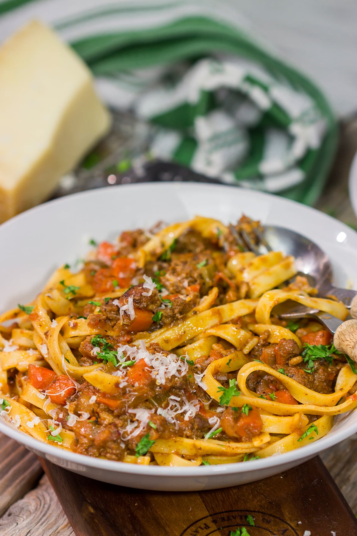 Tagliatelle Bolognese features a slow-cooked meat sauce served over ribbons of pasta. This recipe is classic Italian comfort food at its best!
