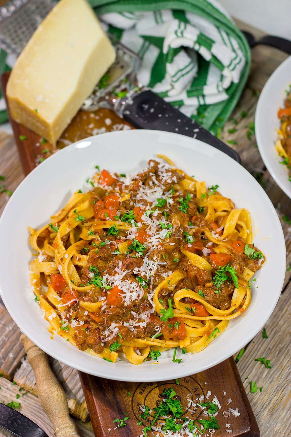 agliatelle Bolognese features a slow-cooked meat sauce served over ribbons of pasta. This recipe is classic Italian comfort food at its best!