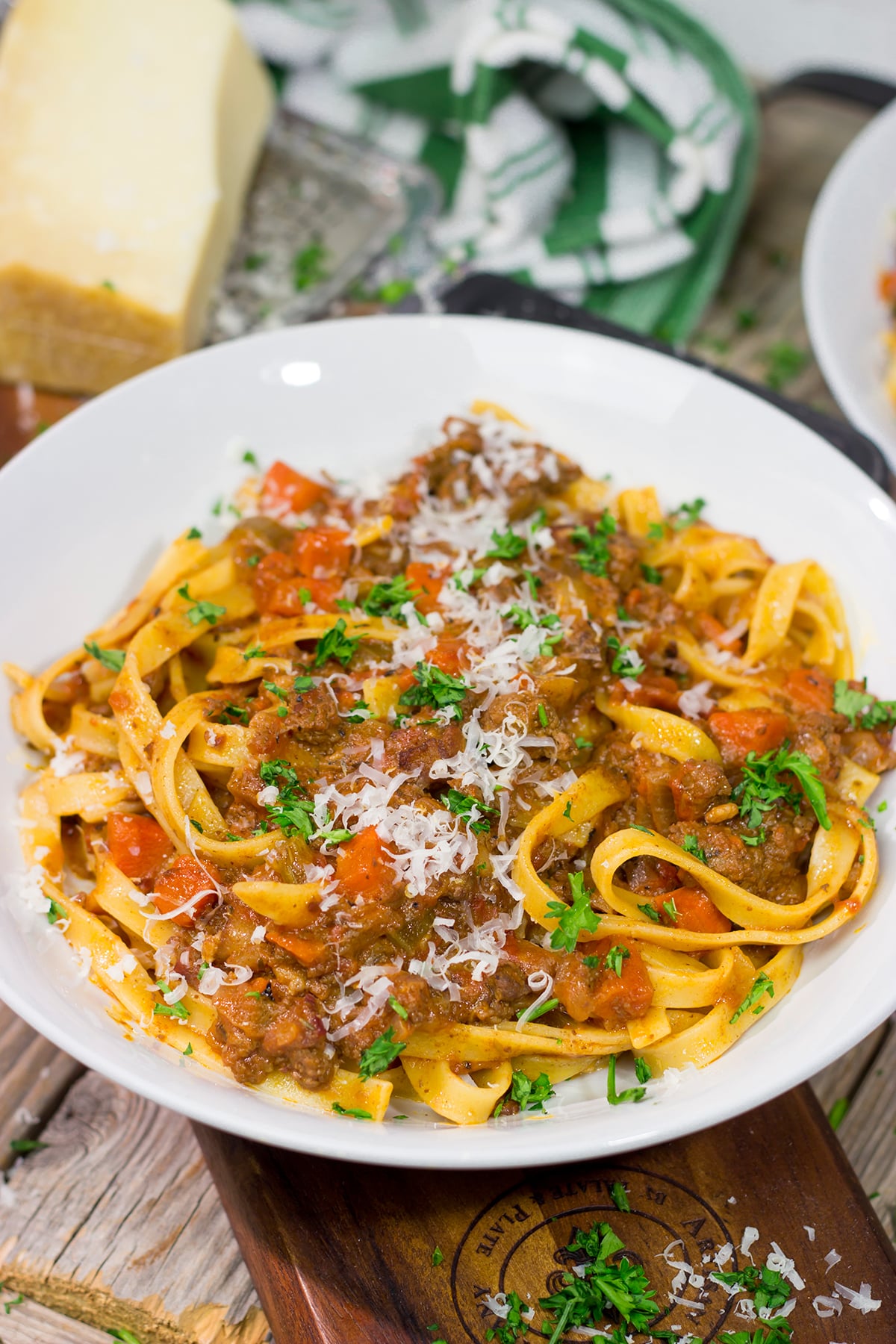 agliatelle Bolognese features a slow-cooked meat sauce served over ribbons of pasta. This recipe is classic Italian comfort food at its best!