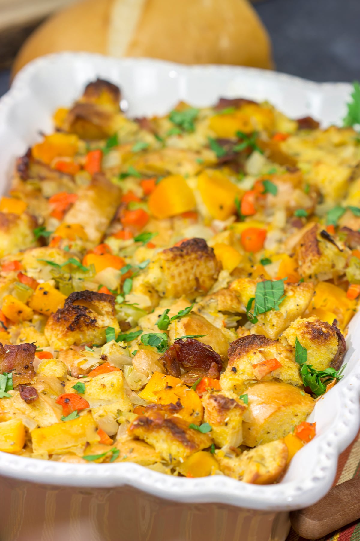 This Bacon and Butternut Squash Stuffing is packed with classic autumn ingredients...and bacon! Whip up a batch for dinner tonight!