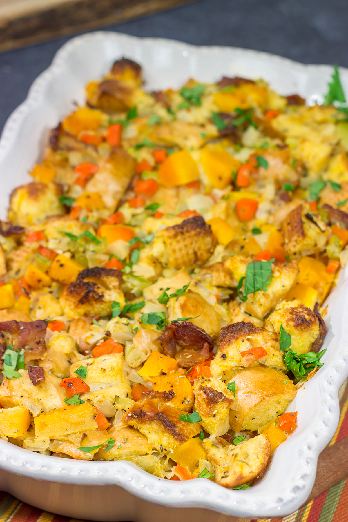 This Bacon and Butternut Squash Stuffing is packed with classic autumn ingredients...and bacon! Whip up a batch for dinner tonight!