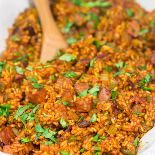 An iconic dish in the Lowcountry region, Charleston Red Rice is a heavily seasoned baked rice recipe that gets its color from tomato paste. Make a batch soon - it's delicious!