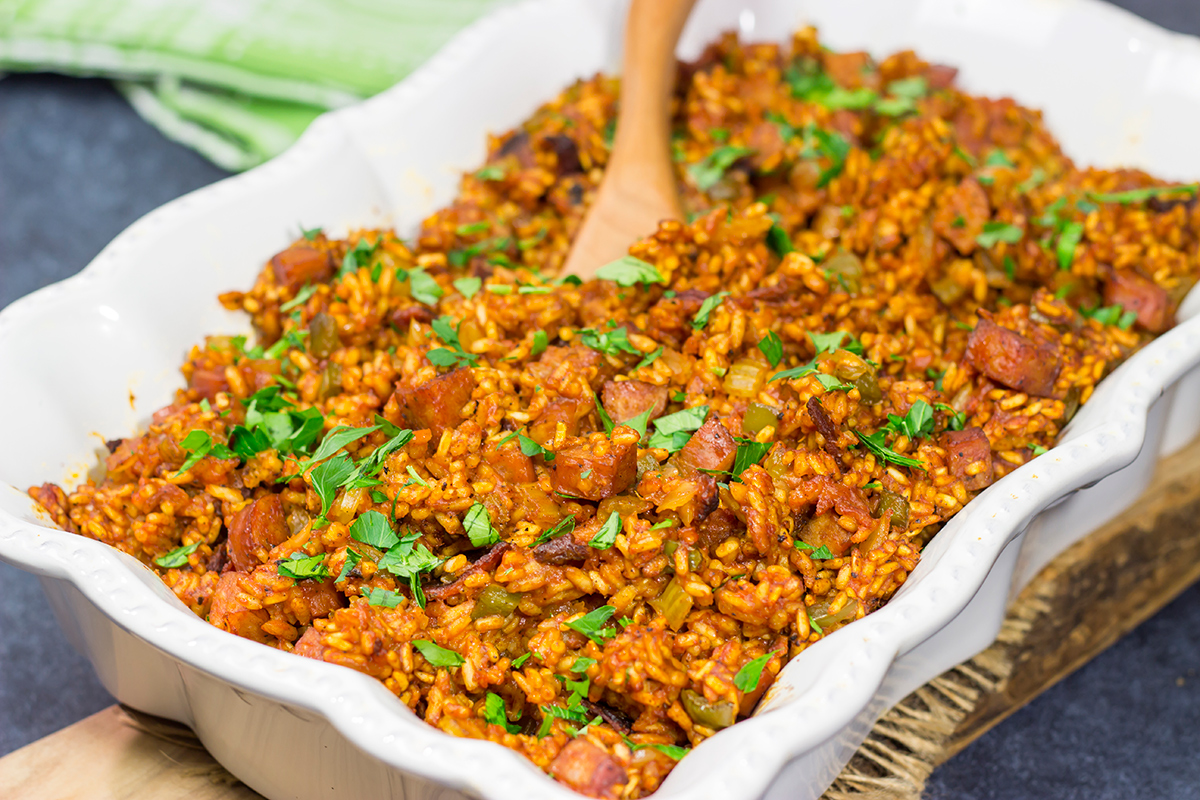 An iconic dish in the Lowcountry region, Charleston Red Rice is a heavily seasoned baked rice recipe that gets its color from tomato paste. Make a batch soon - it's delicious!