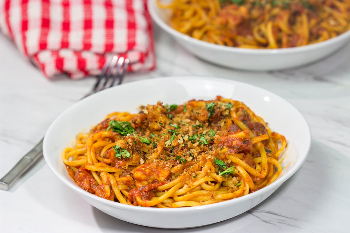 Featuring succulent shrimp tossed with linguine and a spicy red sauce, Shrimp Fra Diavolo is a delicious recipe next time you're craving pasta!