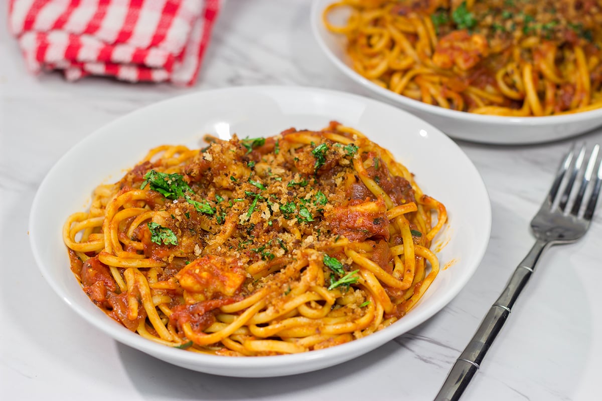 Featuring succulent shrimp tossed with linguine and a spicy red sauce, Shrimp Fra Diavolo is a delicious recipe next time you're craving pasta!