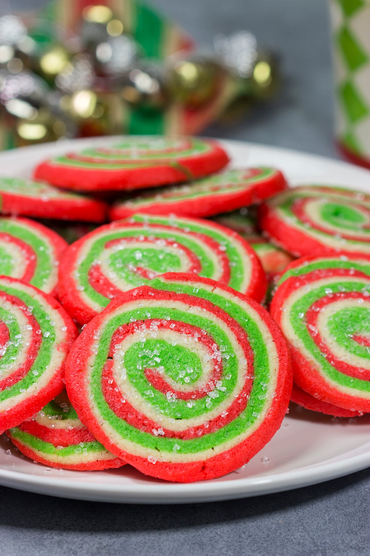 Featuring a fun red and green swirl, this Christmas Sugar Cookies are a festive (and delicious!) way to enjoy the holiday season!