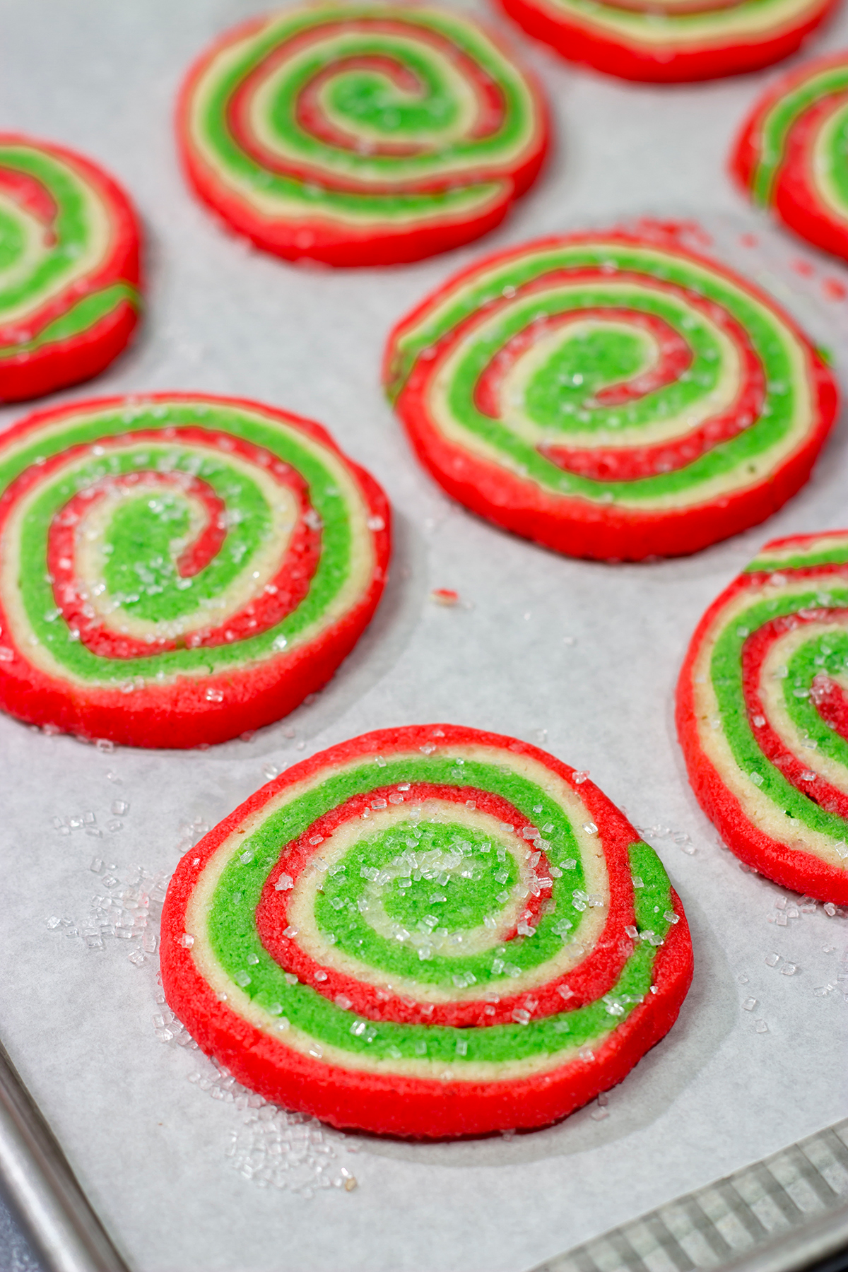 Featuring a fun red and green swirl, this Christmas Sugar Cookies are a festive (and delicious!) way to enjoy the holiday season!