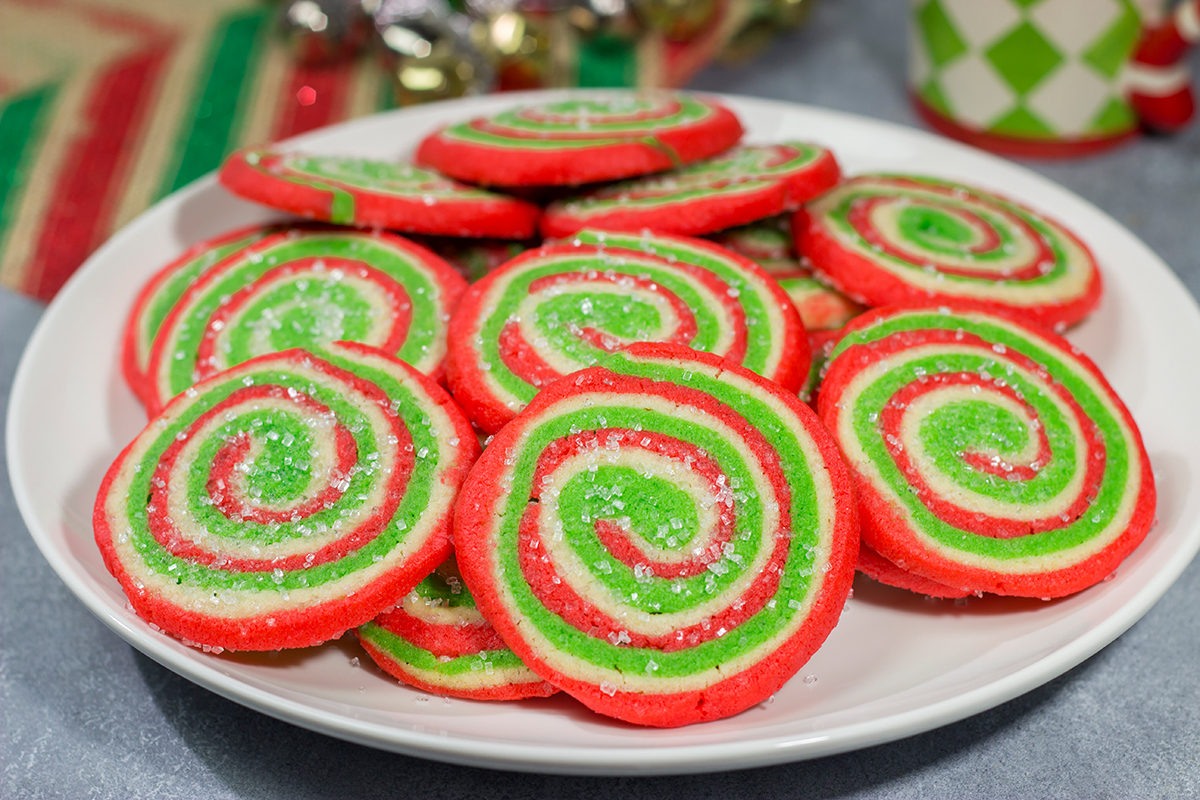 Featuring a fun red and green swirl, this Christmas Sugar Cookies are a festive (and delicious!) way to enjoy the holiday season!