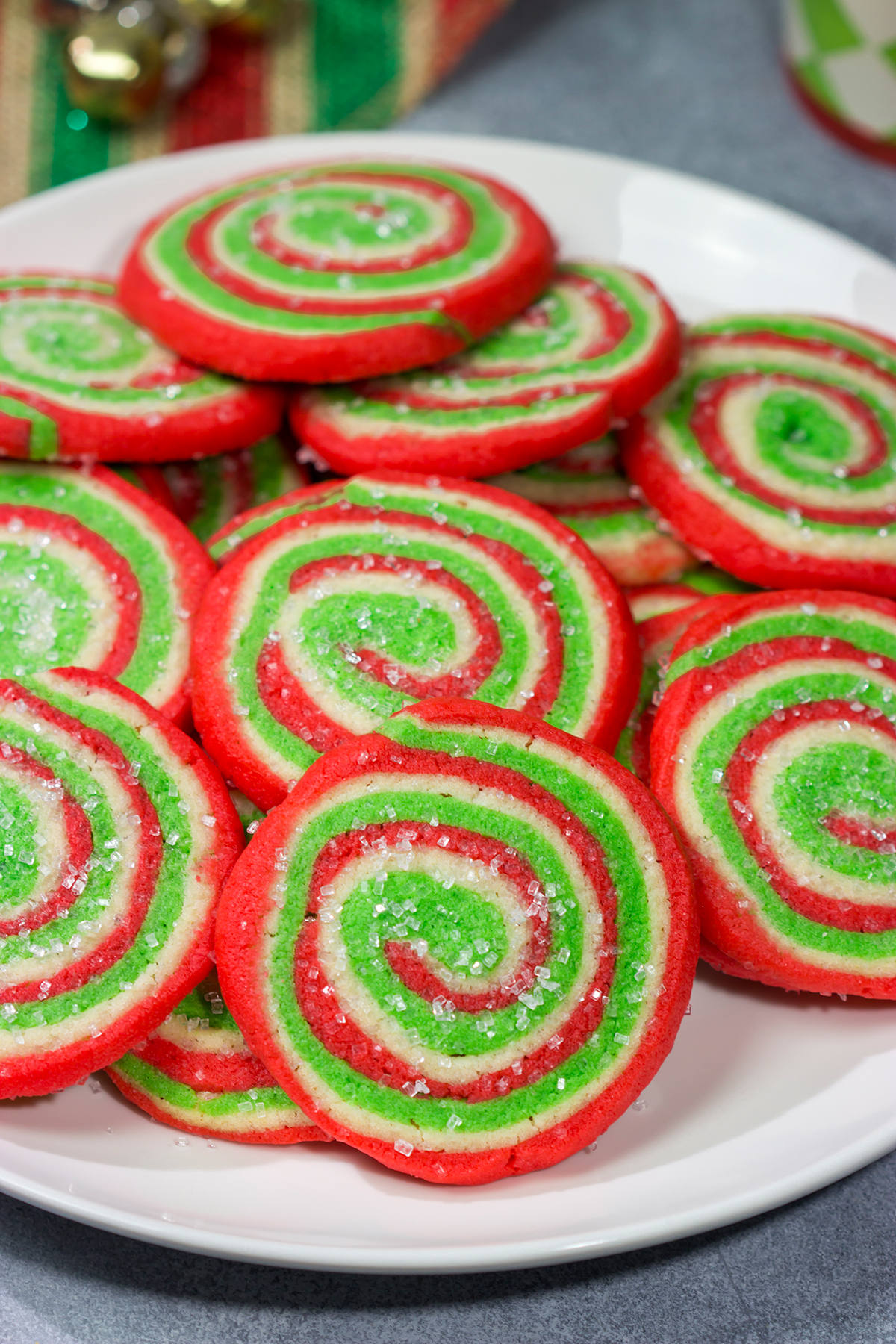 Featuring a fun red and green swirl, this Christmas Sugar Cookies are a festive (and delicious!) way to enjoy the holiday season!