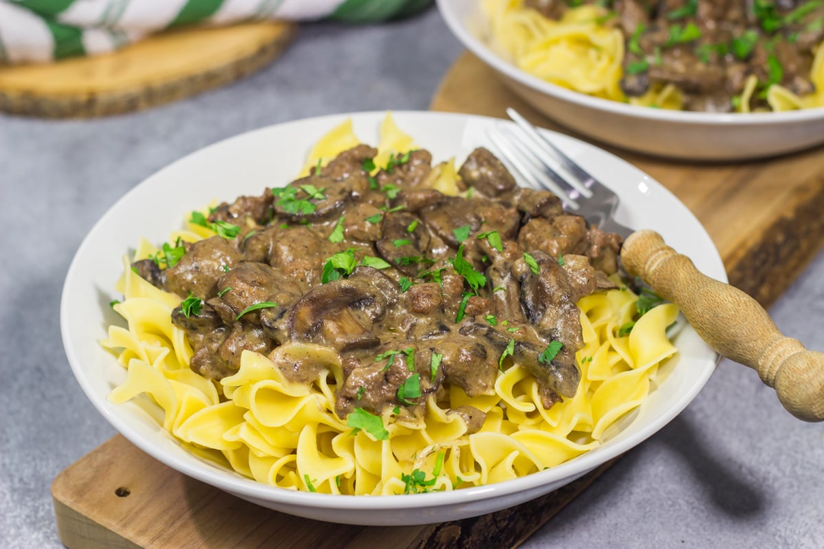 Featuring flavorful ground beef and sautéed mushrooms in a creamy sauce, this Ground Beef Stroganoff makes for an easy and classic comfort food meal!