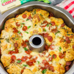 This Pepperoni Pizza Monkey Bread is packed with bread, herbs, pepperoni and 2 types of cheese - it makes for a great gameday appetizer!