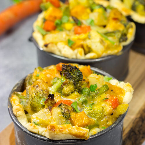 Tired of the same old vegetables as a side dish? Put 'em in a pot pie! Packed with an assortment of roasted veggies, this Roasted Veggie Pot Pie is a unique and tasty dinner recipe!