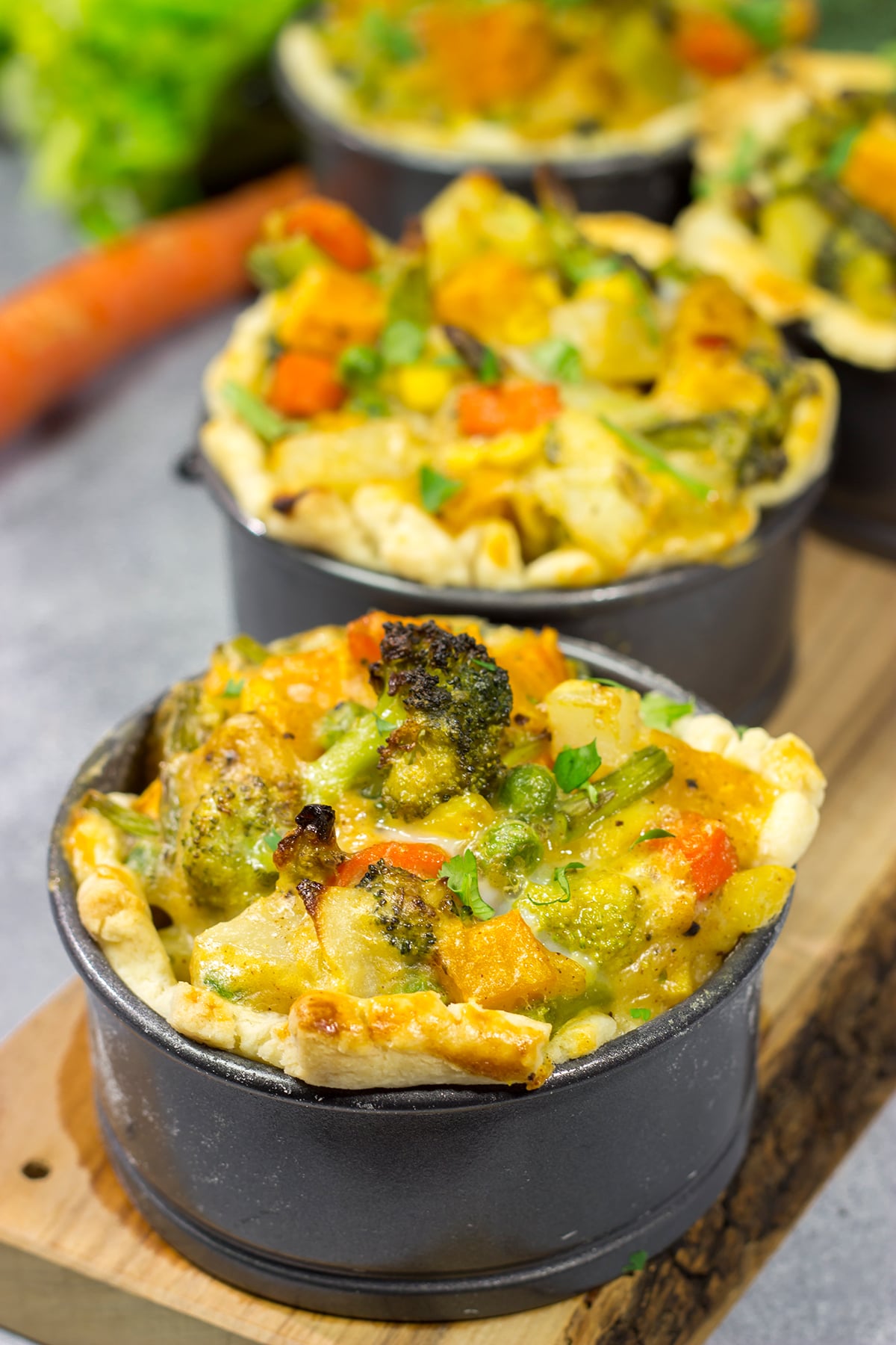 Tired of the same old vegetables as a side dish? Put 'em in a pot pie! Packed with an assortment of roasted veggies, this Roasted Veggie Pot Pie is a unique and tasty dinner recipe!